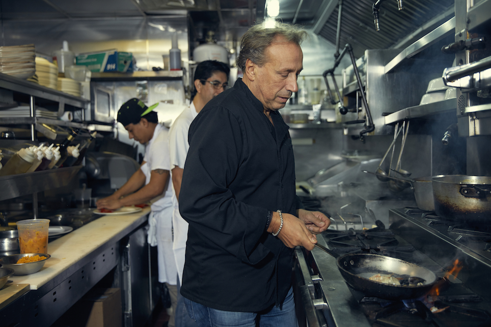 Chef Roberto Paciullo behind the line at his namesake restaurant Roberto's