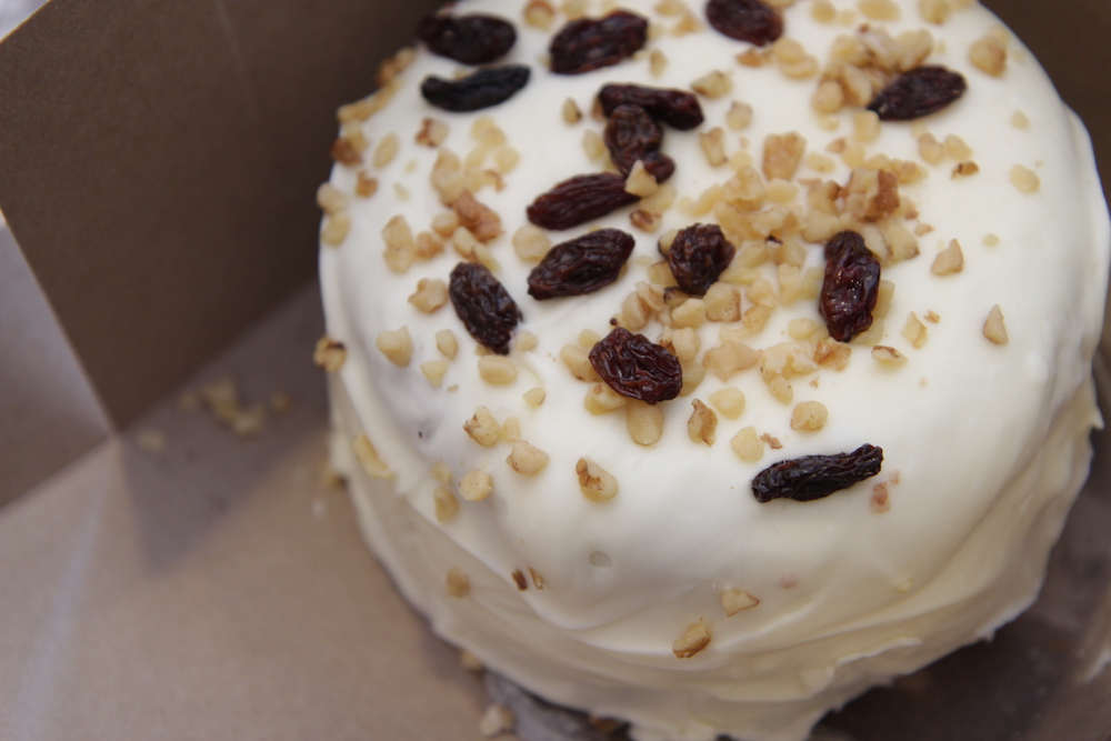 A whole Carrot Cake with raisins and walnuts  