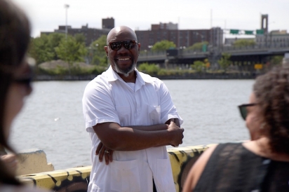 Mychal Johnson leads a public health walking tour of the Port Morris waterfront with Columbia University (