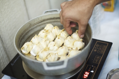 Thai chicken dumplings, made from hand with a lemongrass emulsion 