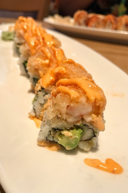 The Tiger Roll: Crabmeat, avocado, tobiko and shrimp tempura w/ Chef special spicy mayo from Yokohama 