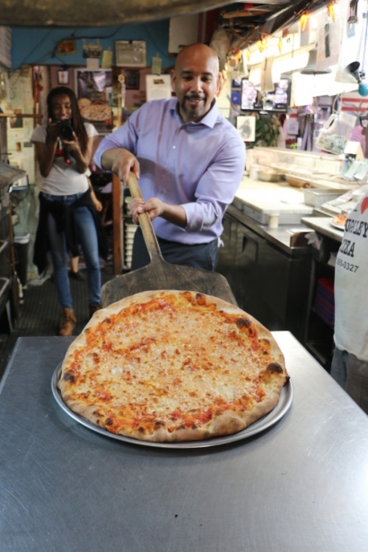 Borough President Ruben Diaz, takes his pie out of the oven at Pugsley’s