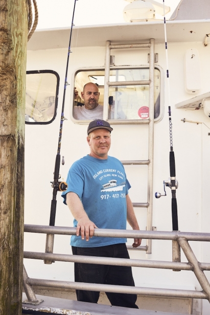 Dan, captain of The Island Current III in the wheelhouse, with onboard mate Steve